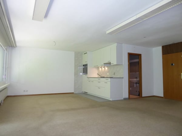 1.5-Zimmer-Studio-Ferienwohnung mit Gartensitzplatz und Tiefgaragenplatz