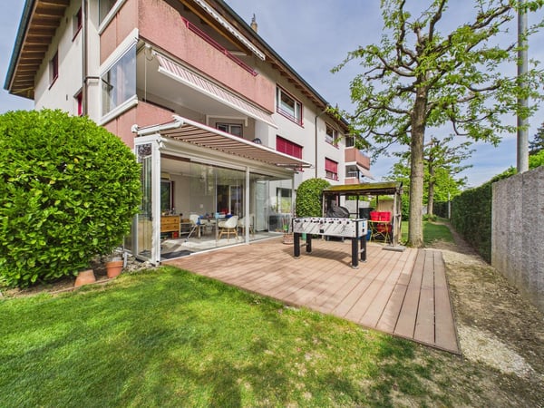 FAMILIENFREUNDLICH MIT GARTEN UND TIEFGARAGE 1
