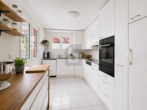 FAMILIENFREUNDLICH MIT GARTEN UND TIEFGARAGE 2