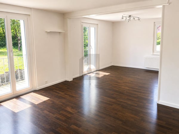 MAISON FAMILIALE AVEC JARDIN ET DOUBLE GARAGE 3