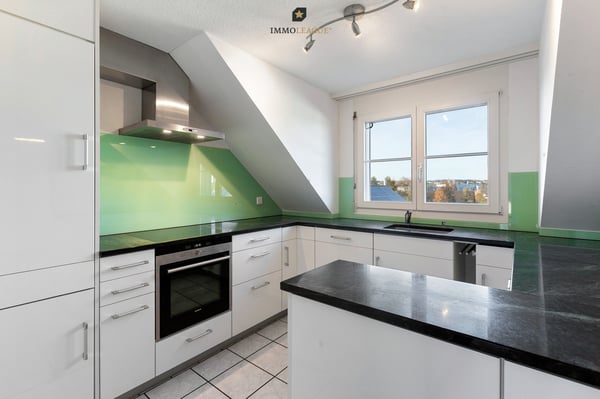 Stilvolle Dach-Maisonettewohnung in beliebtem Wohnquartier. 2