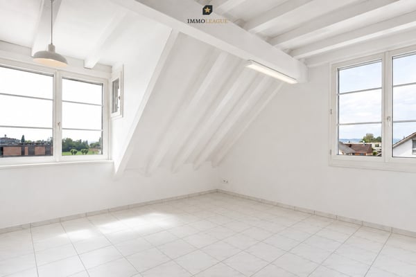 Lichtdurchflutete Maisonette-Dachwohnung mit schöner Seesicht. 5
