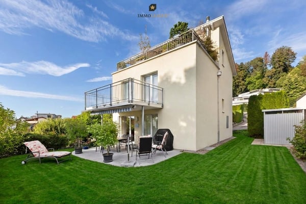 Einfamilienhaus mit Sonnenterrasse, Balkon und zeitloser Architektur 1