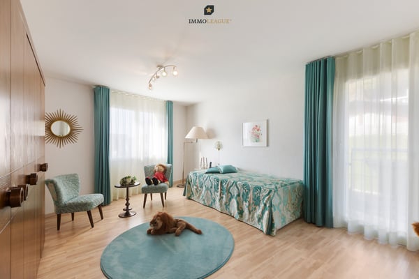 Einfamilienhaus mit Sonnenterrasse, Balkon und zeitloser Architektur 5