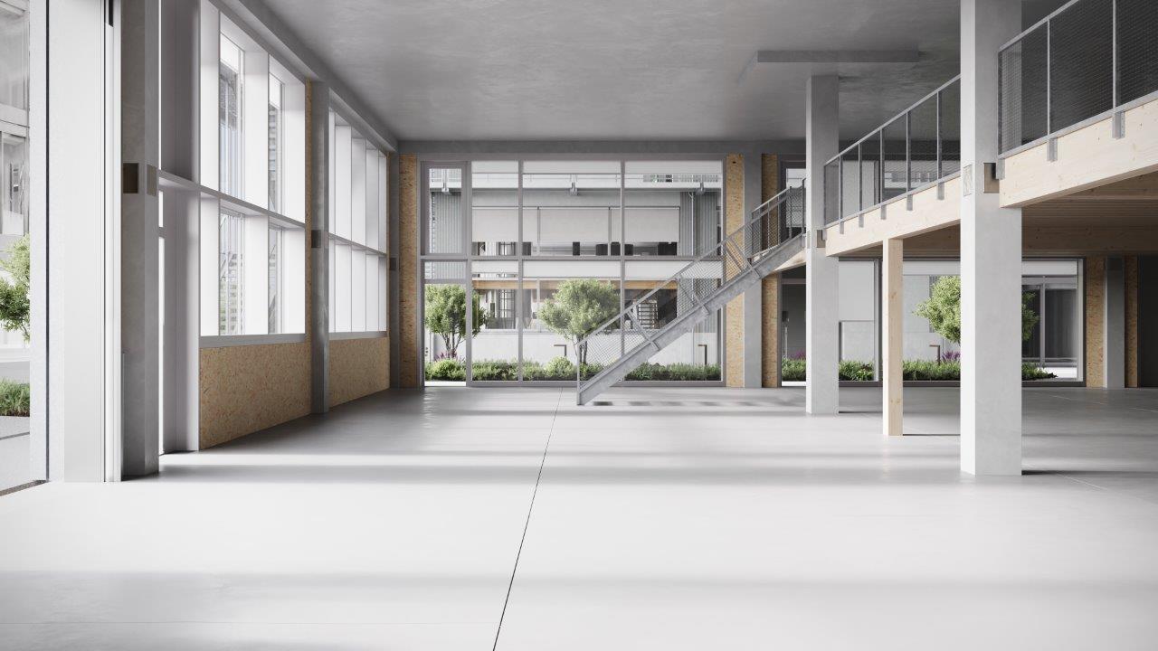 Empty building with large windows, concrete floor, staircase, balcony