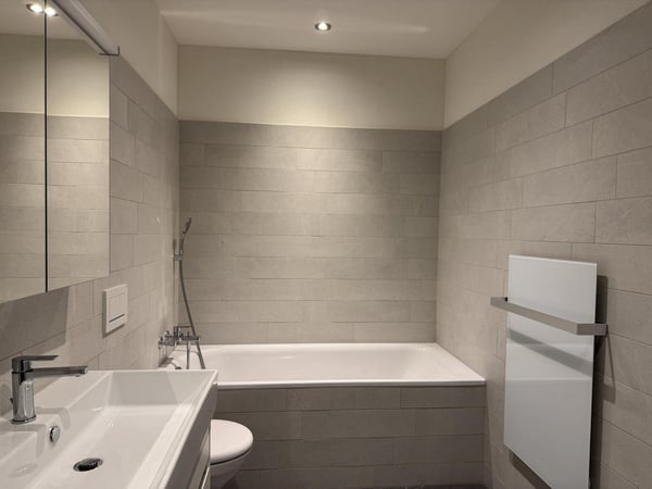 Moderne 3.5-Zimmer-Parterrewohnung mit Sitzplatz 12