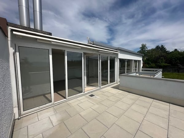 attraktive 4 1/2-Zimmer-Attikawohnung an ruhiger und sonniger Wohnlage 4