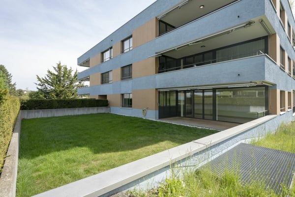 Moderne Eigentumswohnung mit eigenem Garten: 120 m² pures Grün 1