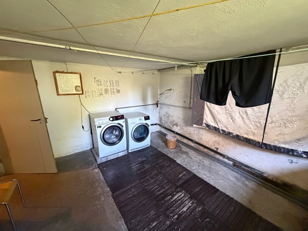 WOHN- UND GESCHÄFTSHAUS AN ZENTRALER LAGE 20