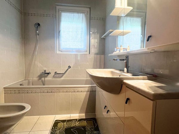 Meravigliosa casa unifamiliare con giardino, vista e posizione soleggiata 14