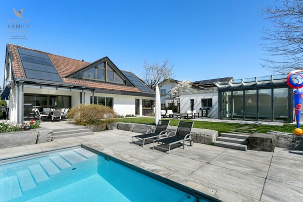 Elegantes Einfamilienhaus mit traumhafter Gartenanlage und Poolidylle 3
