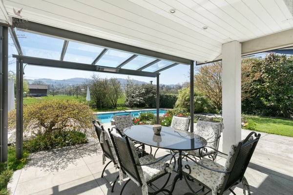 Elegantes Einfamilienhaus mit traumhafter Gartenanlage und Poolidylle 9