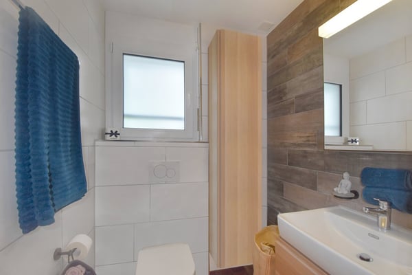 Moderne 2.5-Zimmerwohnung mit grossem Garten und Aussenparkplatz 11
