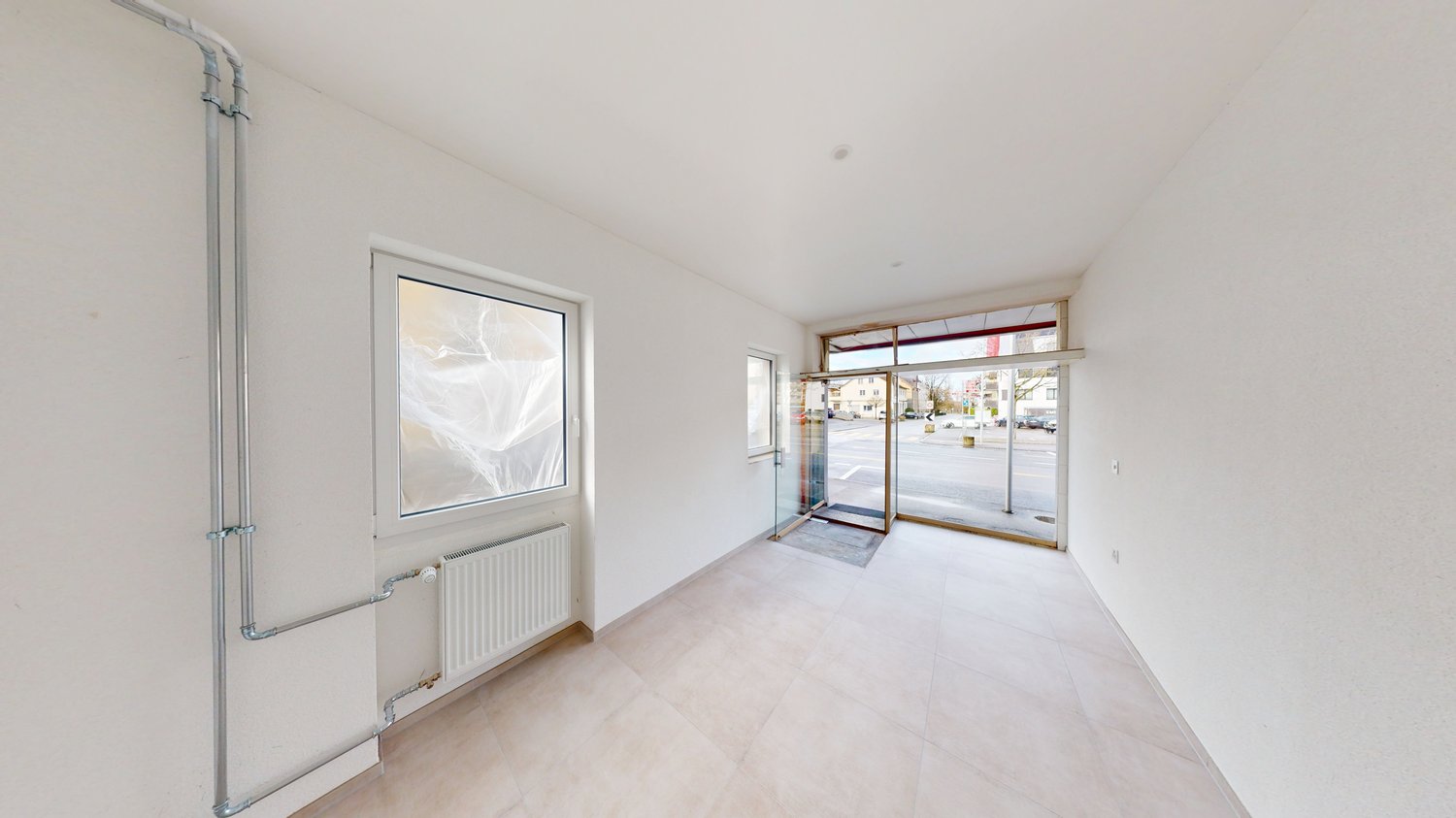 empty room, white tiled floor, windows, heating system