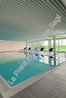 Luminoso appartamento di 2.5 locali con piscina e vista panoramica a Mendrisio 1