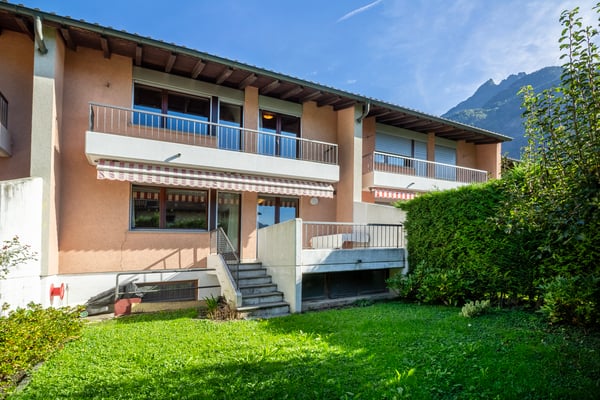 Accogliente casa unifamiliare a schiera con giardino 1