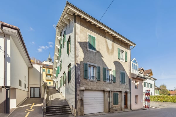 Immeuble de rendement composé de 3 appartements et un local 1