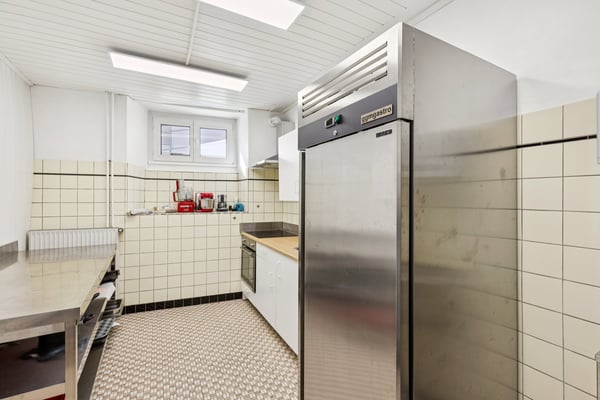 Immeuble de rendement composé de 3 appartements et un local 12