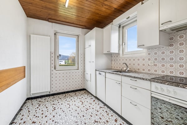 Maison individuelle avec grand potentiel à Rossemaison 4