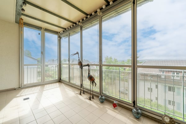 Attraktive Etagenwohnung mit Wintergarten und Alpensicht 10