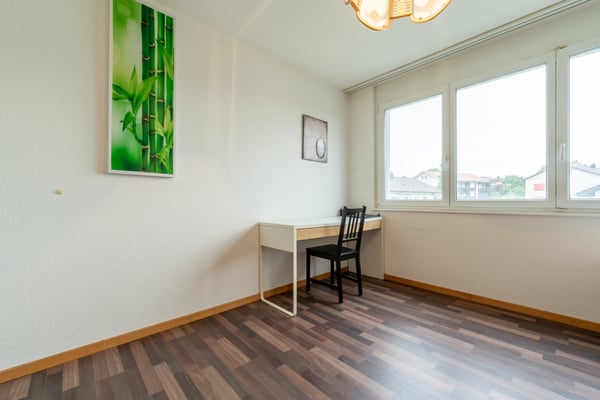 Attraktive Etagenwohnung mit Wintergarten und Alpensicht 8