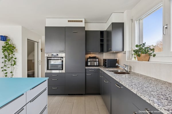 Charmante Maisonette-Dachwohnung in Bassersdorf mit Sonnenbalkon 2