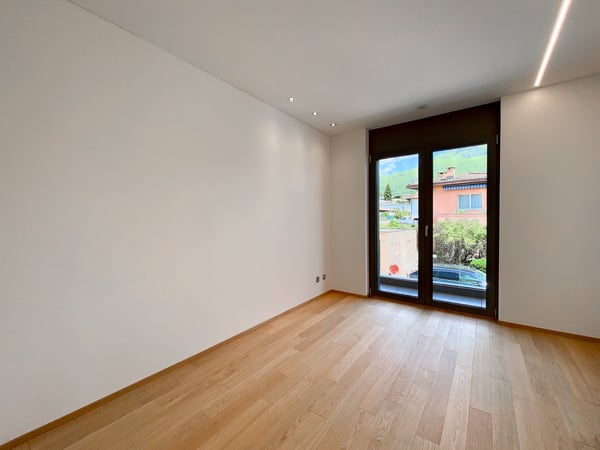 Moderno 1.5 locali in prima locazione a Comano 2