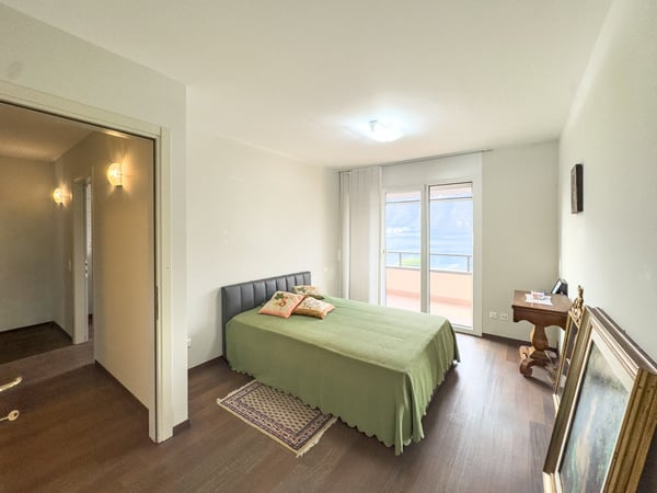 Appartamento vista lago con giardino a Bissone 5