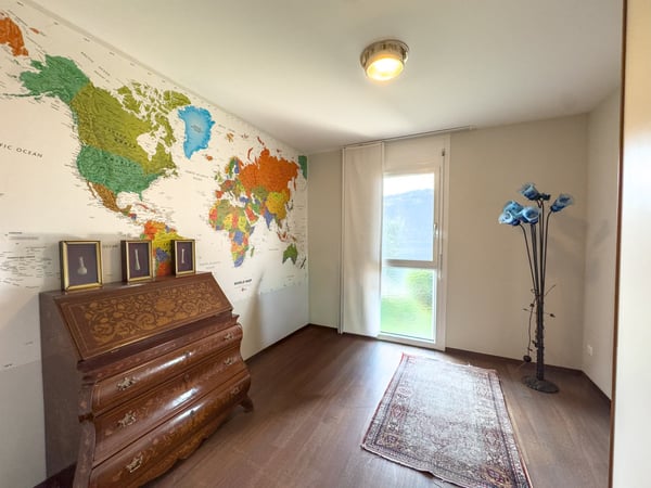 Appartamento vista lago con giardino a Bissone 6