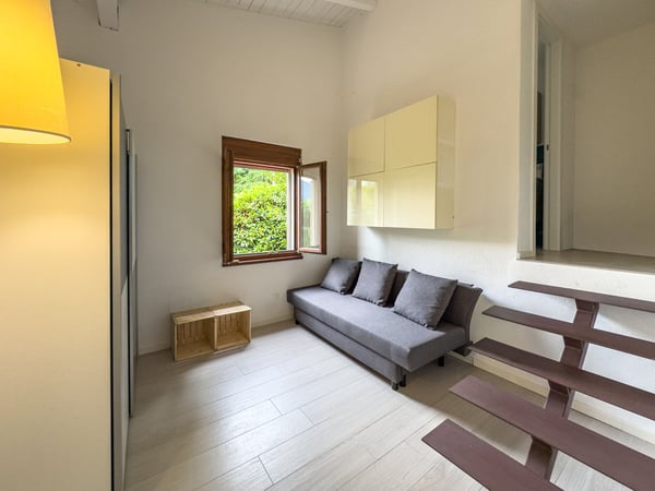 Casa gemella vista lago con giardino a Bissone 7