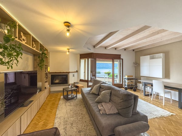 Casa gemella vista lago con giardino a Bissone 1