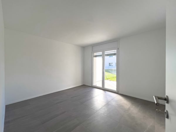 1.5 locali con ampio giardino a Caslano 4