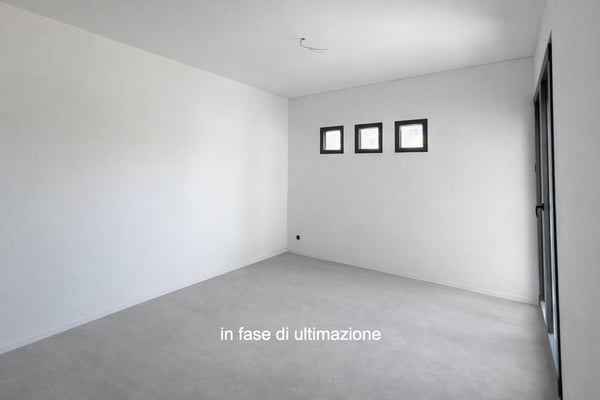 Moderno e nuovo 3.5 locali duplex con giardino a Melano 2
