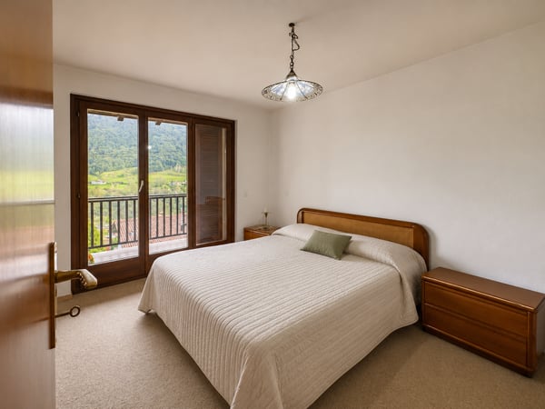 Casa gemella con giardino in vendita ad Arogno 4
