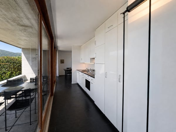Casa contigua con giardino a Villa Luganese 4