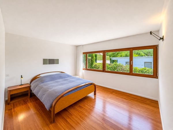 Casa contigua con giardino a Villa Luganese 5