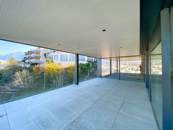 Esclusivo attico con splendida vista lago a Paradiso 4