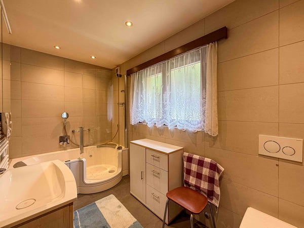 Casa gemella con giardino e locale hobby a Vezia 7