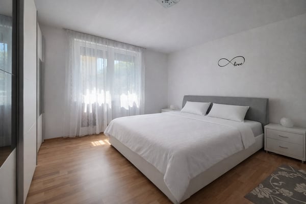 Casa bifamiliare con giardino a Canobbio 9