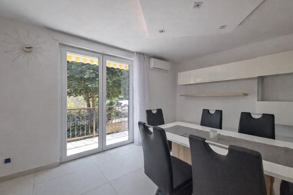 Casa bifamiliare con giardino a Canobbio 7