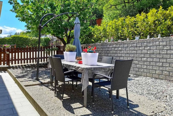 Casa bifamiliare con giardino a Canobbio 10
