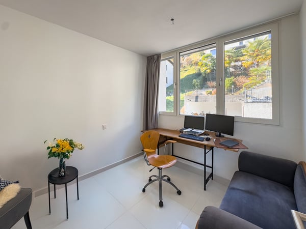 Moderna casa contigua con giardino ad Agno 6