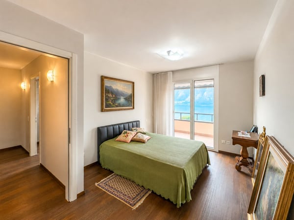 Appartamento vista lago con giardino a Bissone 5