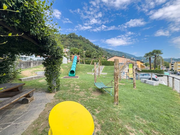 Casa a schiera con giardino ad Agno 11