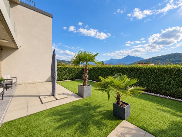 Casa a schiera con giardino ad Agno 10