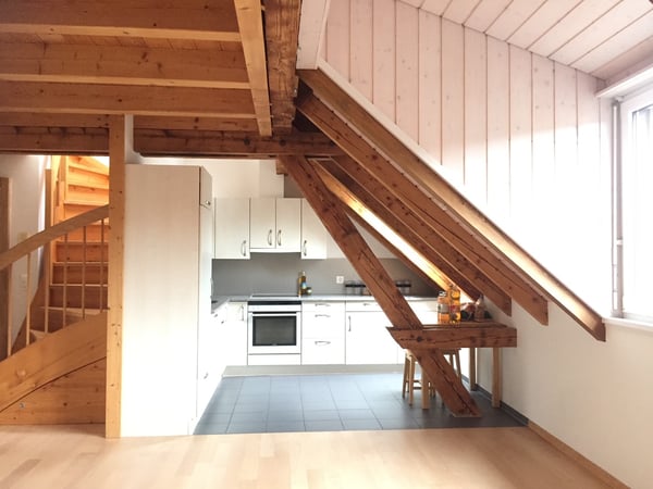 Charmante Dachwohnung auf 2 Etagen mit viel Holz 3
