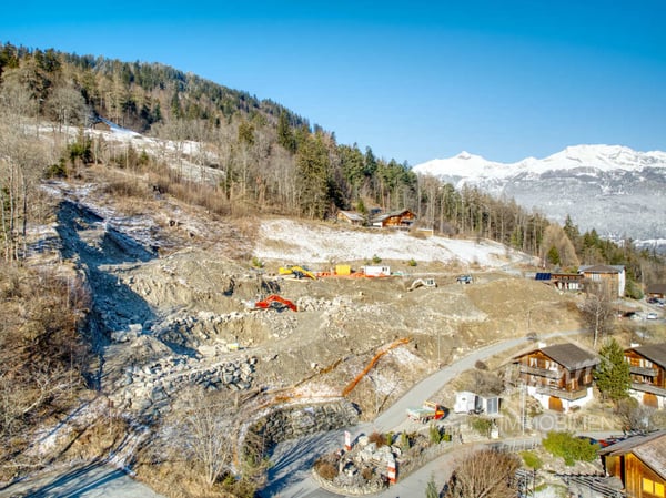 Bauland erschlossen mit 9 Bewilligten Bauten 7
