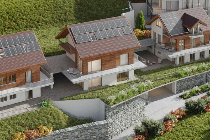 Three houses with solar panels on the roof, balconies, and green roofs