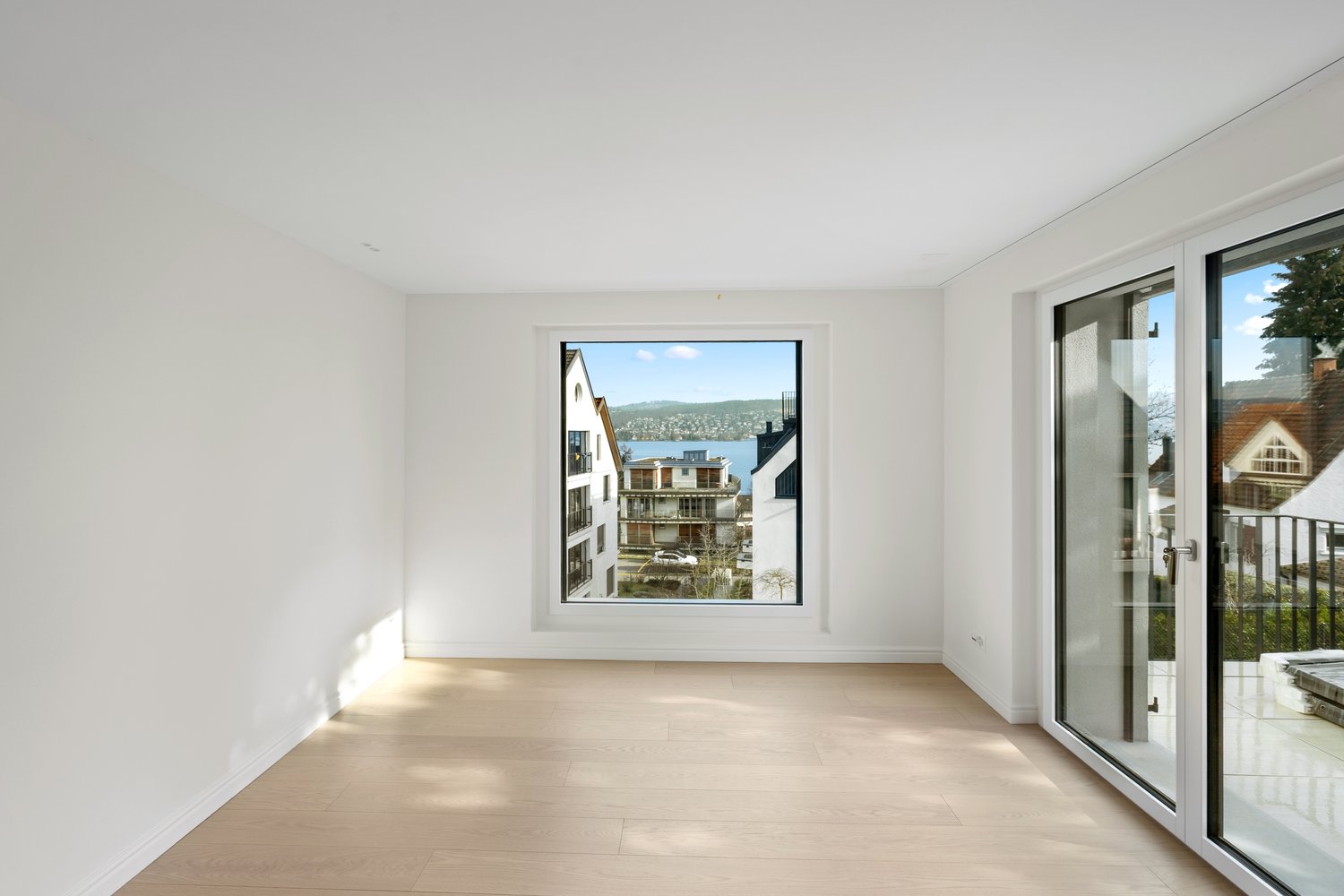 empty room, large window, wooden floor, sliding glass doors, balcony