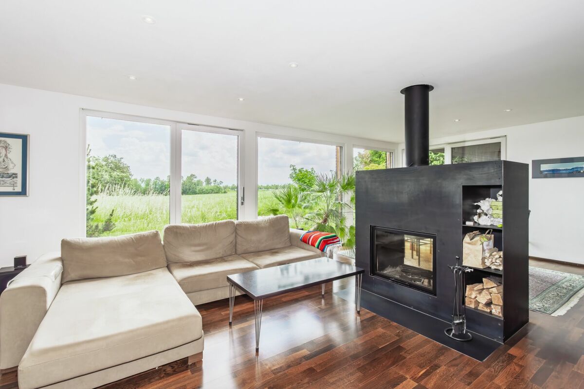 Charaktervolles 4.5-Zimmer-Architektenhaus - Moderne Holzarchitektur mit unverbaubarer Weitsicht